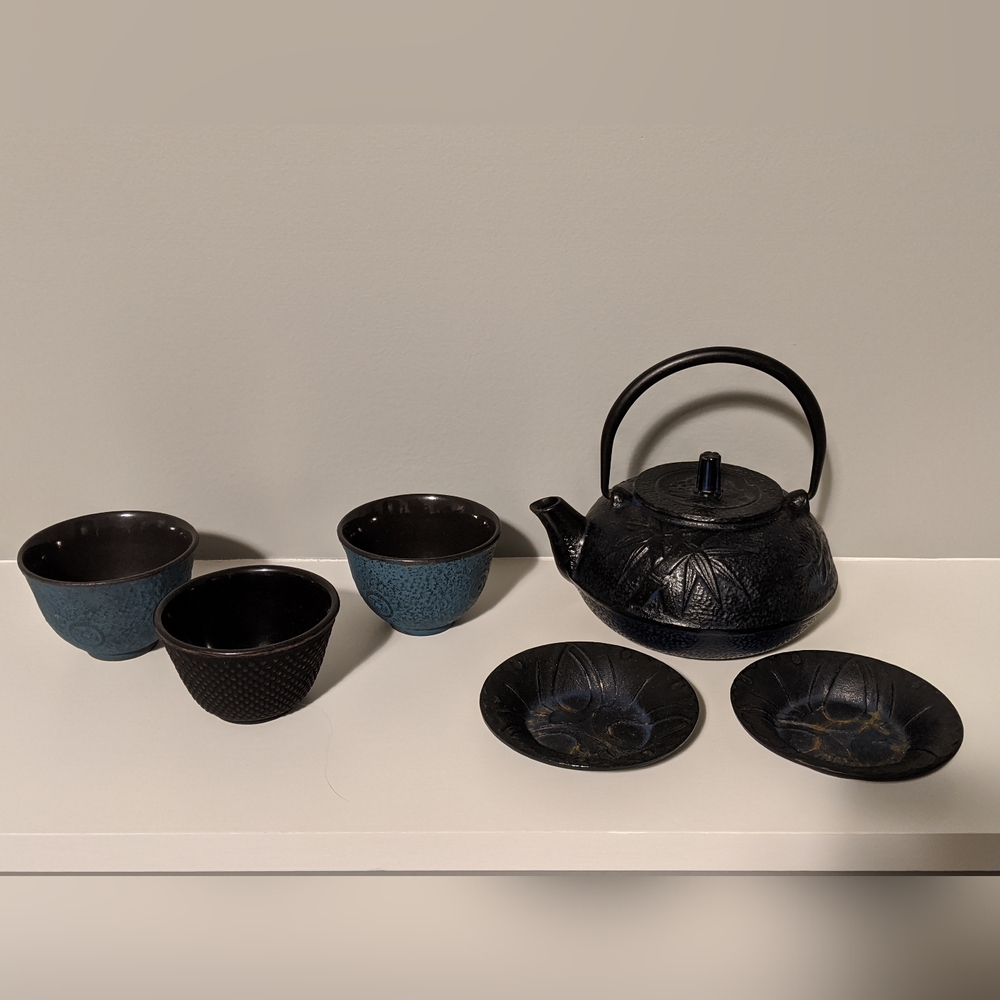 Japanese cast iron teapot set with cups and saucers